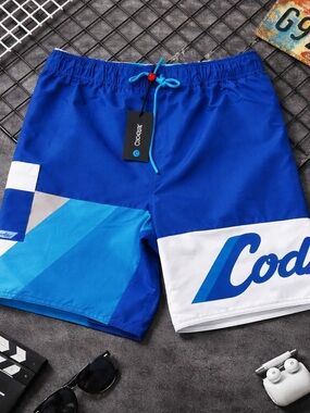 XL COOKIES SWIM SHORTS🔥 Cargo pockets/ wrap around logo/ dead stock $89